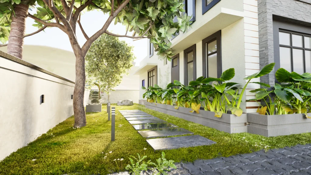 Garden walkway with grey granite stepping stones, lush green tropical plants, and outdoor accent lighting.